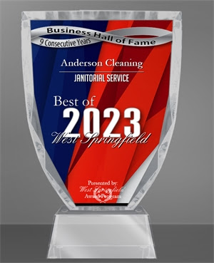 Crystal glass trophy awarded to Anderson Cleaning for Best of West Springfield 2023 in Janitorial Services, symbolizing excellence in commercial cleaning.